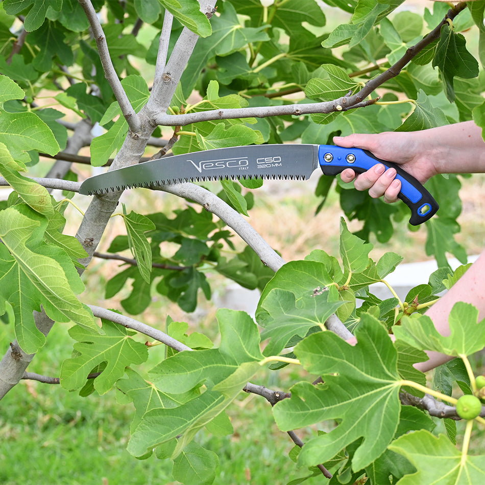 Vesco C50/32 Curved Blade Saw cutting through branch of a fruit tree