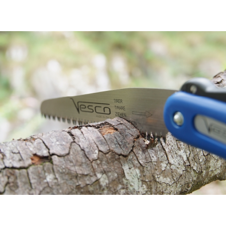 Vesco C10 Folding Saw cutting through branch